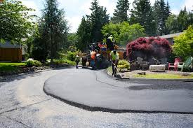 Best Driveway Removal and Replacement  in Muscatine, IA