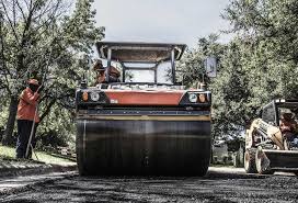 Best Driveway Snow Removal Preparation  in Muscatine, IA